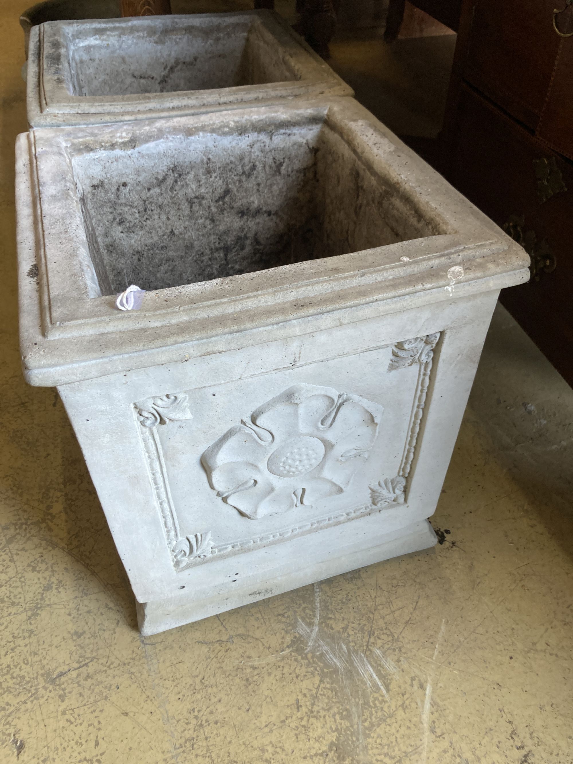 A pair of reconstituted stone square garden planters, width 40cm, height 43cm